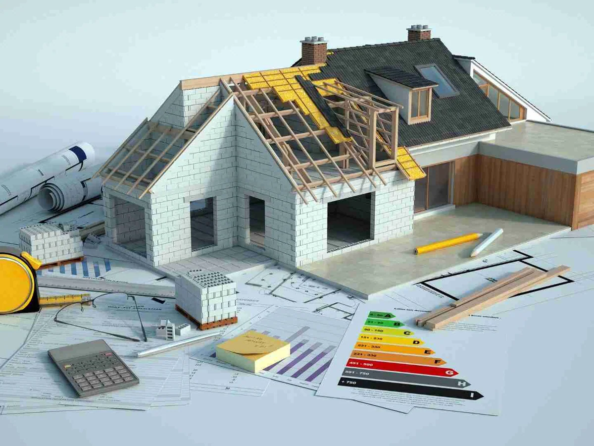 Maqueta de construcción y planos arquitectónicos